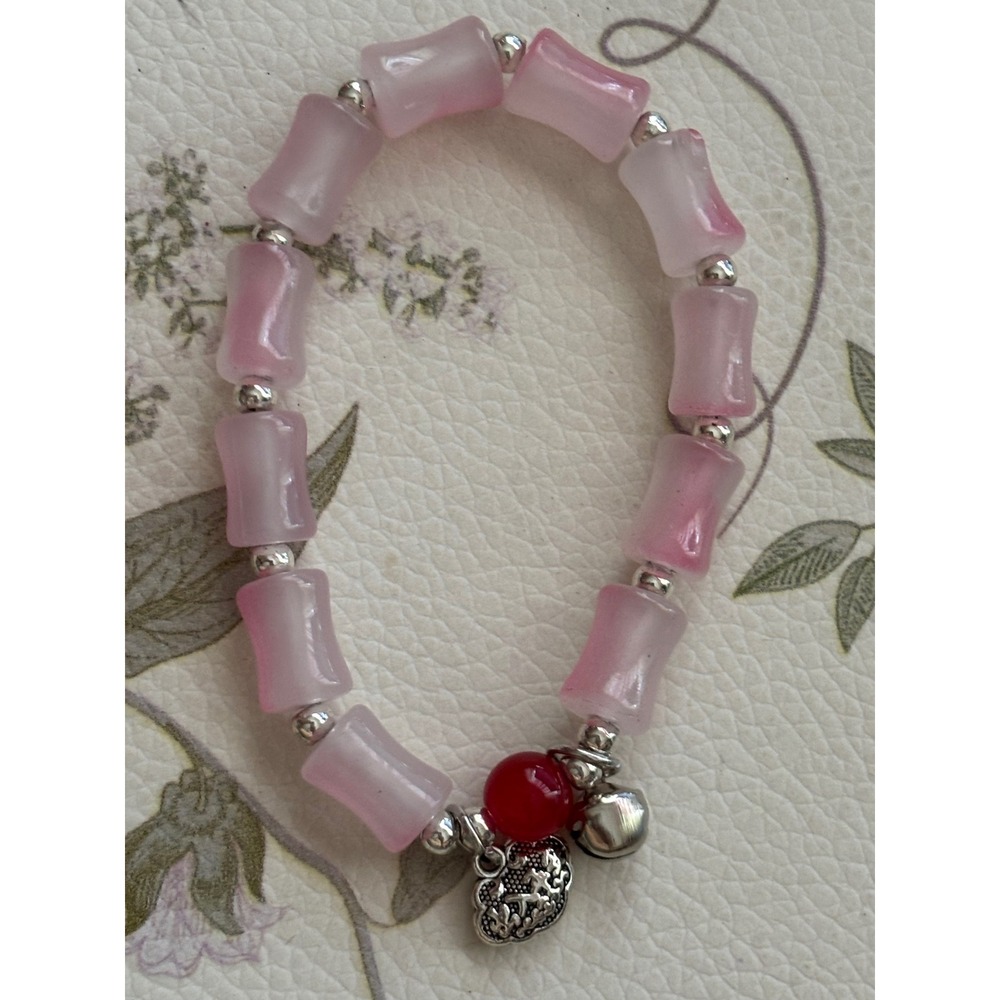 Pink Bamboo Bead Stretch Bracelet Red Accent Silver Bell Longevity Lock Charm